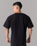 Champion Tee - Black - Unmatched Kicks - Alphalete