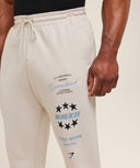 Global Lifting Graphic Pant oversized fit Tinted White - Unmatched Kicks - GYMSHARK