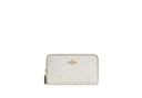 Medium Id Zip Wallet In Signature Canvas - Unmatched Kicks - COACH