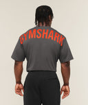 Power T-Shirt oversized fit Onyx Grey/Bold Orange - Unmatched Kicks-GYMSHARK
