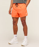 Train 5" Short slim fit Dayglow Peach - Unmatched Kicks - GYMSHARK